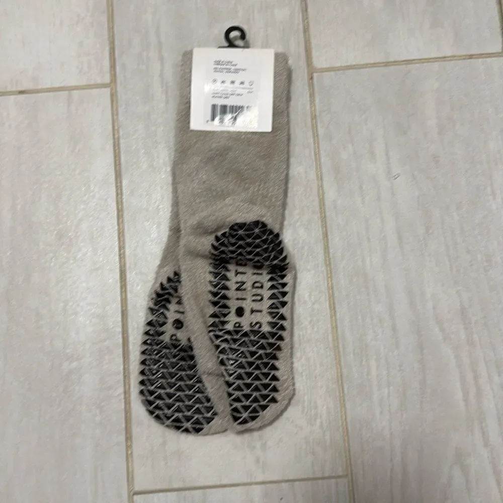 NWT fuzzy smiley pointe studio grip socks. Size small